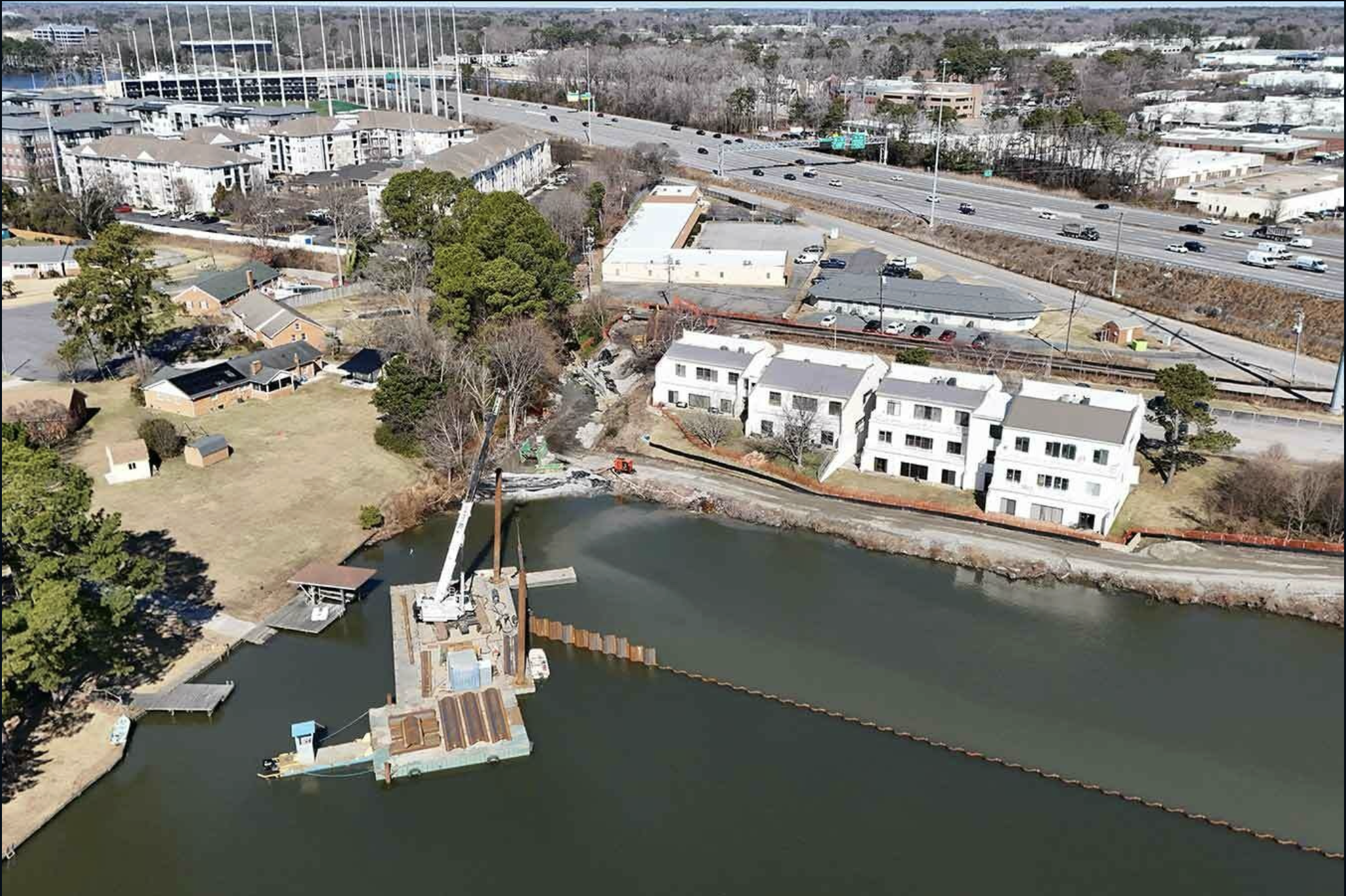 Aerial view of the wooded parcel by the lake